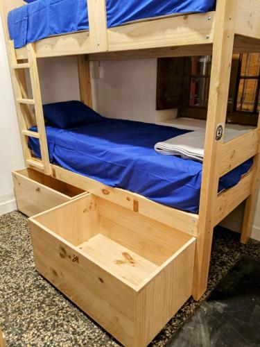 Ένα ή περισσότερα κρεβάτια σε δωμάτιο στο Lima Hostel
