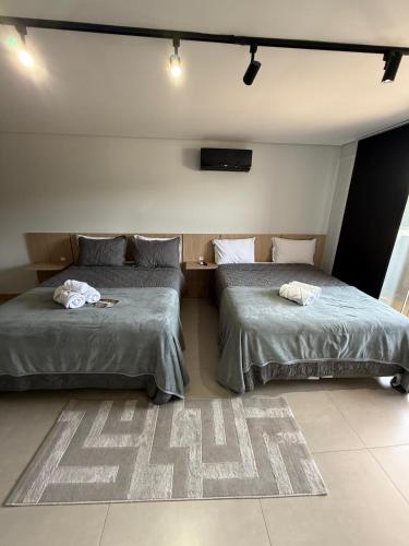 Una cama o camas en una habitación de Studios 422
