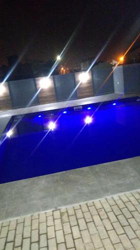 a row of lights on a stage at night at Dk residêncial CASA INTEIRA in Pontal do Paraná