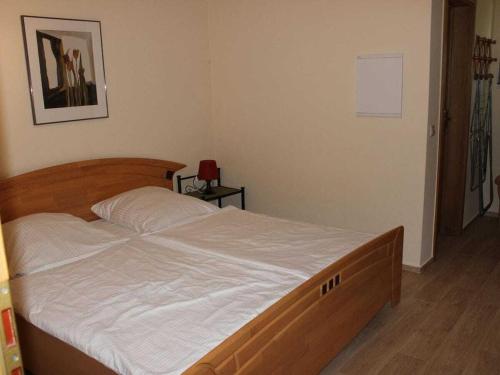 Ένα ή περισσότερα κρεβάτια σε δωμάτιο στο Bungalow Holiday Park Lenzer Höh VII