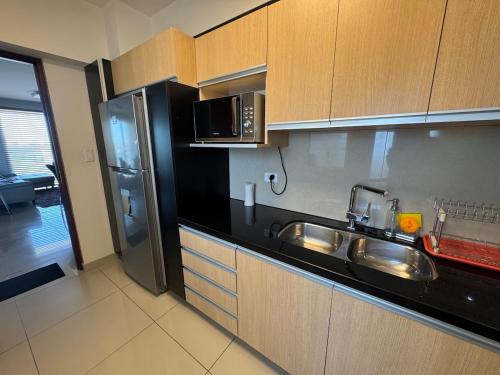 Kuchyň nebo kuchyňský kout v ubytování Family Apartment WiFi Large Pool Comfortable Central