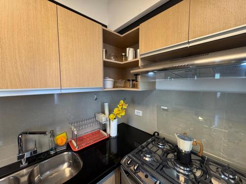 Kuchyň nebo kuchyňský kout v ubytování Family Apartment WiFi Large Pool Comfortable Central