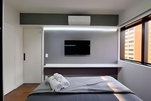 Postel nebo postele na pokoji v ubytování Ibirapuera Premium Flat II