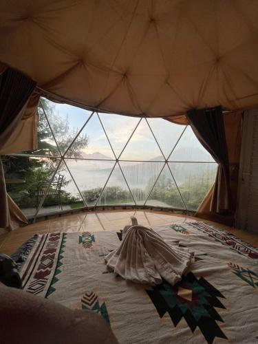 Postel nebo postele na pokoji v ubytování Jungle camping kintamani