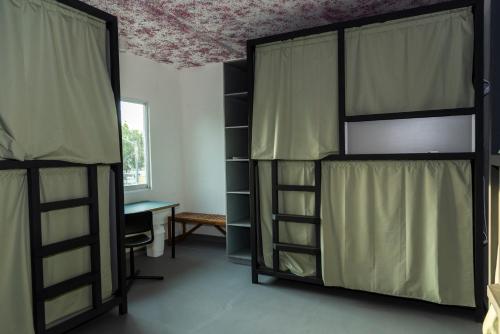 Ein Bett oder Betten in einem Zimmer der Unterkunft Hostel Nube Mía