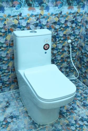 Ένα μπάνιο στο Sivagini rooms and services