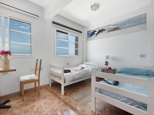 Postel nebo postele na pokoji v ubytování Holiday Home in Puerto near Playa Jardín