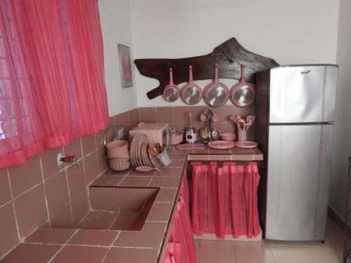 Кухня или мини-кухня в Casa Rosa Pastel
