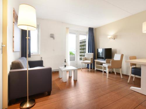 Posezení v ubytování Apartment in Brouwershaven by Grevelingenmeer