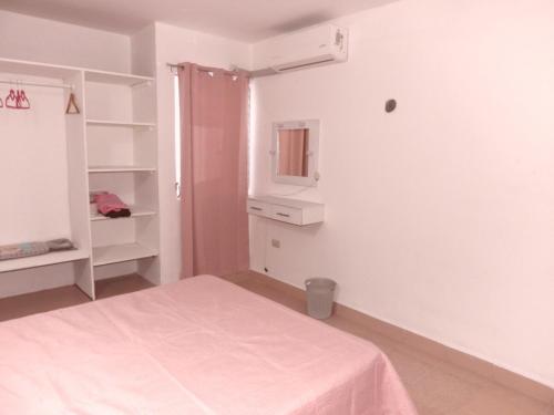 Кровать или кровати в номере Casa Rosa Pastel