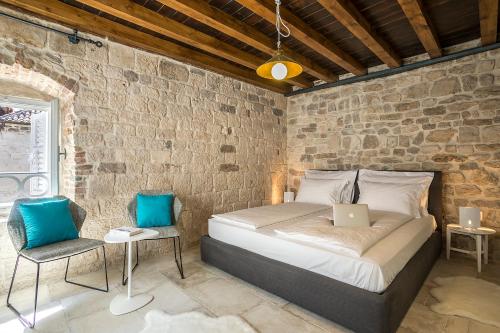Posteľ alebo postele v izbe v ubytovaní Bella Notte Di Spalato
