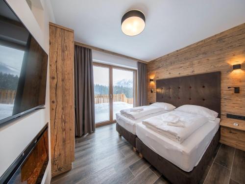 Postel nebo postele na pokoji v ubytování Chalet in Neukirchen near Wildkogel Ski Arena
