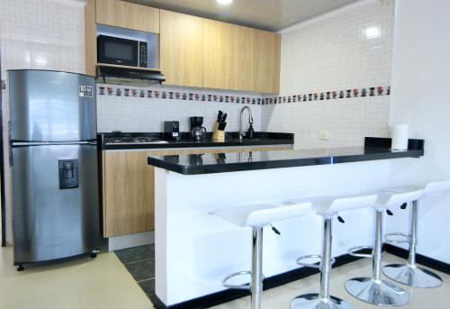Η κουζίνα ή μικρή κουζίνα στο Apartamento 2 piso