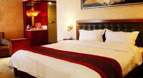 Ένα ή περισσότερα κρεβάτια σε δωμάτιο στο Metropark Hotel
