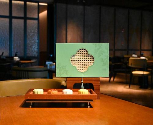 a table with a picture of a heart on it at Four Points by Sheraton Urumqi in Ürümqi