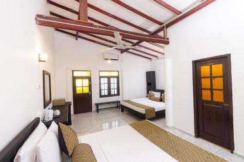 Katil atau katil-katil dalam bilik di Palazzo Beach Hotel