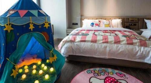 Katil atau katil-katil dalam bilik di Tomeet Hotel
