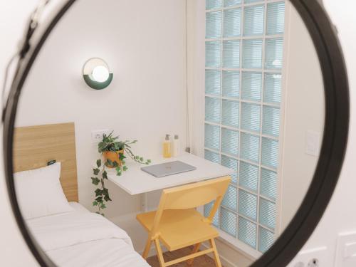 Katil atau katil-katil dalam bilik di The Road Mini Hotel