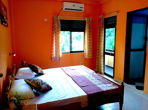 Postel nebo postele na pokoji v ubytování Basilico Homestay