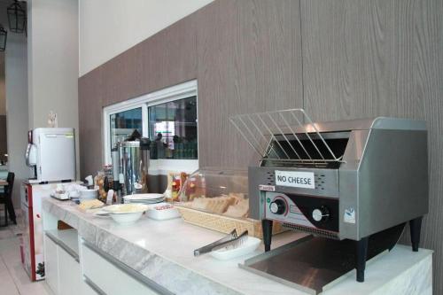Cucina o angolo cottura di Elegancy Sansabai Hotel