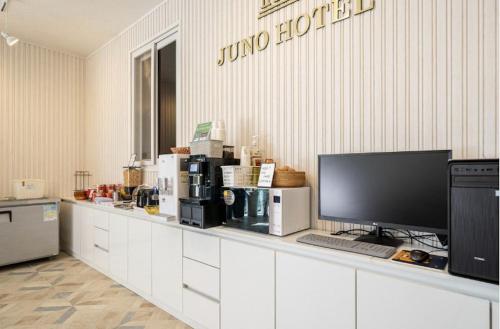 Mokpo Juno Hotelにあるコーヒーまたはお茶