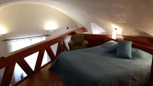 Ліжко або ліжка в номері Apartment in a 16th Century Fortress in Tuscany