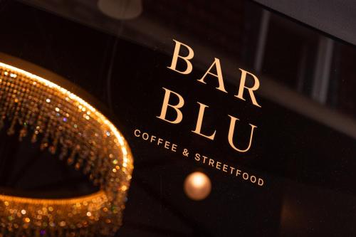 a bottle of bar blub coffee and street food at D28 Bruges in Bruges