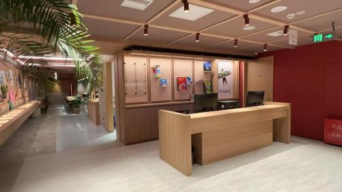 a lobby of an office with a reception desk at Jingfengyan's Home in Beijing
