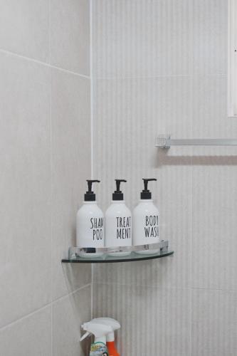 a shelf in a bathroom with at 코지스테이 in Seoul