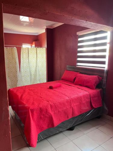 Postel nebo postele na pokoji v ubytování X-Motel Seshego