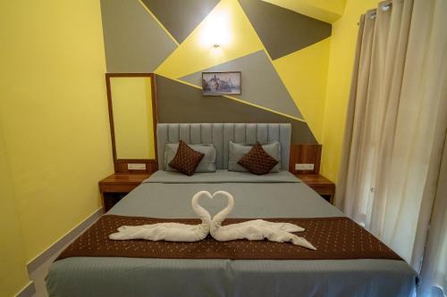 Letto o letti in una camera di Villa near Vagator Beach