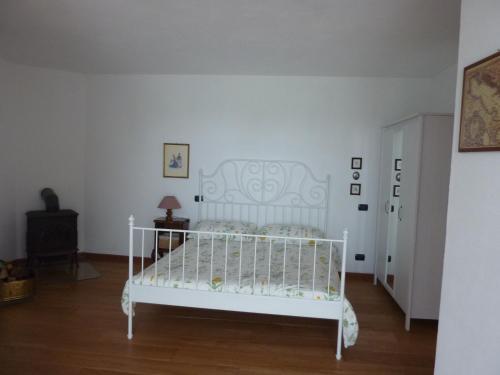 Ένα ή περισσότερα κρεβάτια σε δωμάτιο στο Ciabòt Taricchi