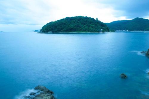 an island in the middle of a large body of water at MISAKI TERRACE in Ako