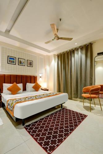 Voodi või voodid majutusasutuse Qotel Comfort AT Residency Kaushambi Anand Vihar toas