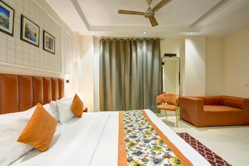 Voodi või voodid majutusasutuse Qotel Comfort AT Residency Kaushambi Anand Vihar toas
