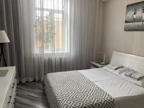 Katil atau katil-katil dalam bilik di Apartment Sobornaya 54