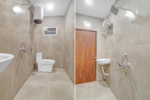 a bathroom with a toilet and a sink and a shower at Super Townhouse Rcc Pride in Hyderabad
