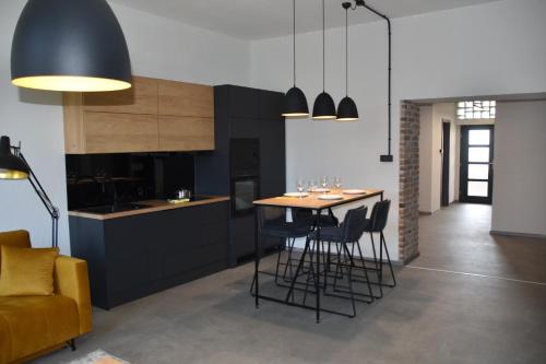 Kuchyň nebo kuchyňský kout v ubytování S36 Apartman