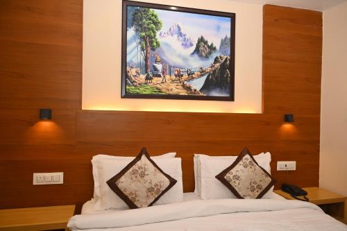 Katil atau katil-katil dalam bilik di Hotel Golden Potala