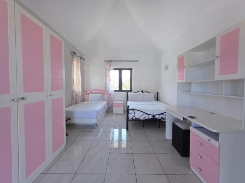 Postel nebo postele na pokoji v ubytování Villa Privée Piscine 6 chambres