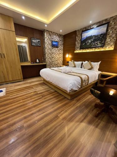 Katil atau katil-katil dalam bilik di Hotel Golden Potala
