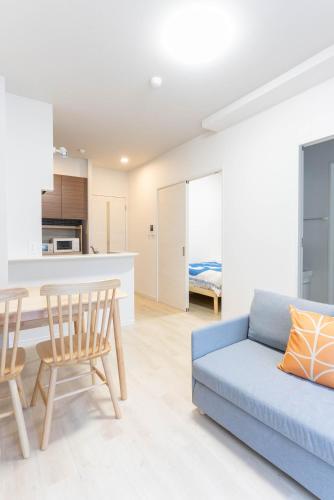 Η κουζίνα ή μικρή κουζίνα στο Ekimae apartment