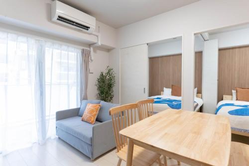 Χώρος καθιστικού στο Ekimae apartment