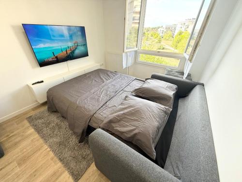 Χώρος καθιστικού στο Appartement deux pièces refait à neuf parking et wifi