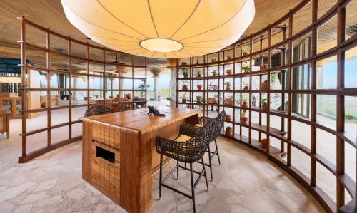 a large room with a table and chairs at South Palms Resort and Spa Panglao - MGallery Collection in Panglao