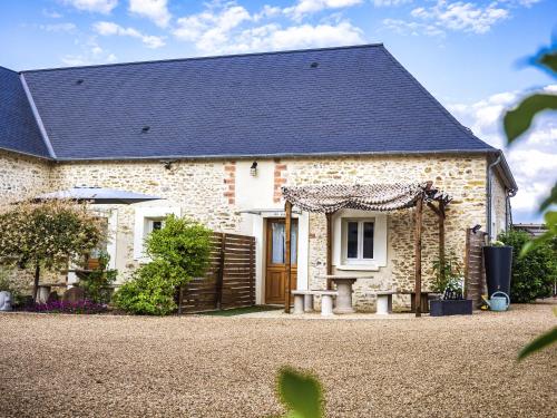 Zahrada ubytování Les gîtes du Hameau des deux ailes