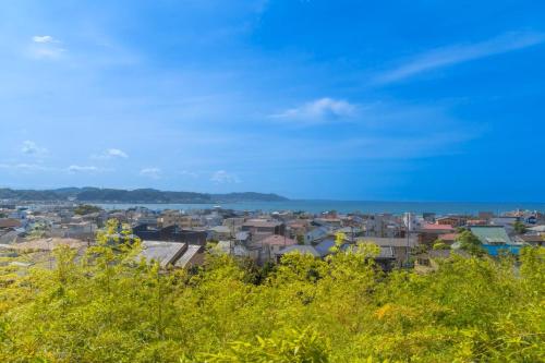 a view of a city from a hill at アロハ鎌倉 in Kamakura