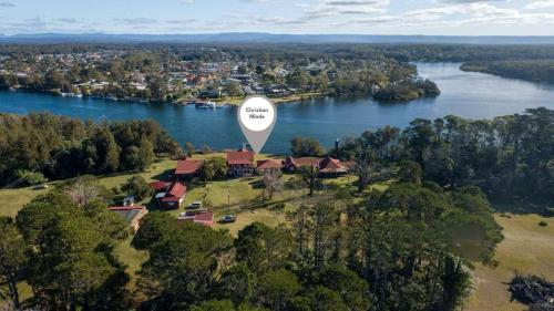 an aerial view of a house with a hot air balloon at Christian's Minde, Jervis Bay in Sussex inlet