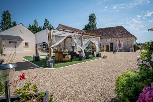 Zahrada ubytování Les gîtes du Hameau des deux ailes
