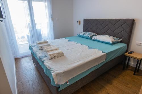 Krevet ili kreveti u jedinici u okviru objekta Floret Suite